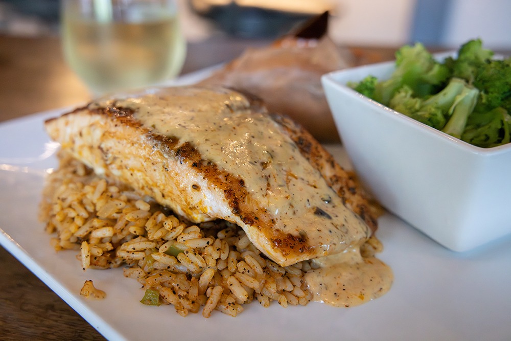 Pan Seared Salmon over rice at Simon's Bolivar