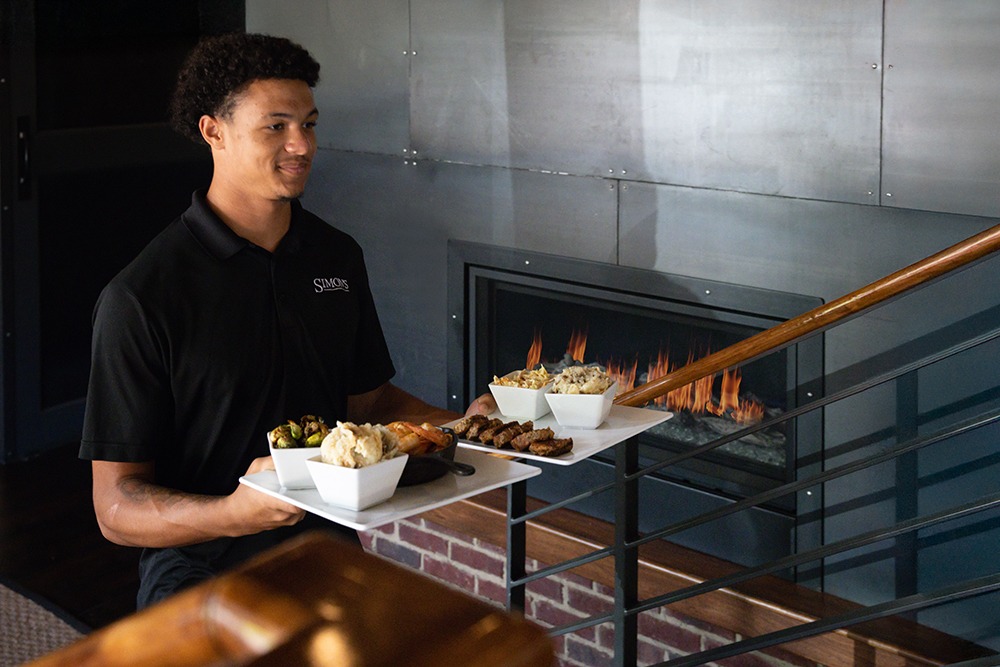 Simon's server carrying tray